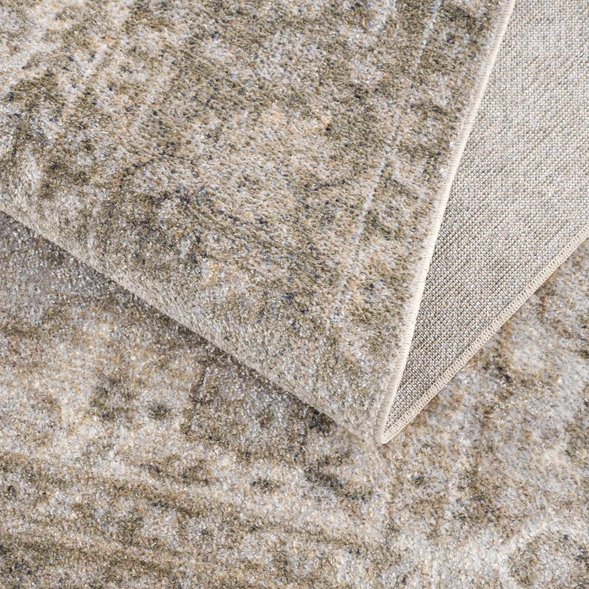 Folded Gael Boutique washable rug by Boutique Rugs, showing soft texture and neutral color for cozy home decor.