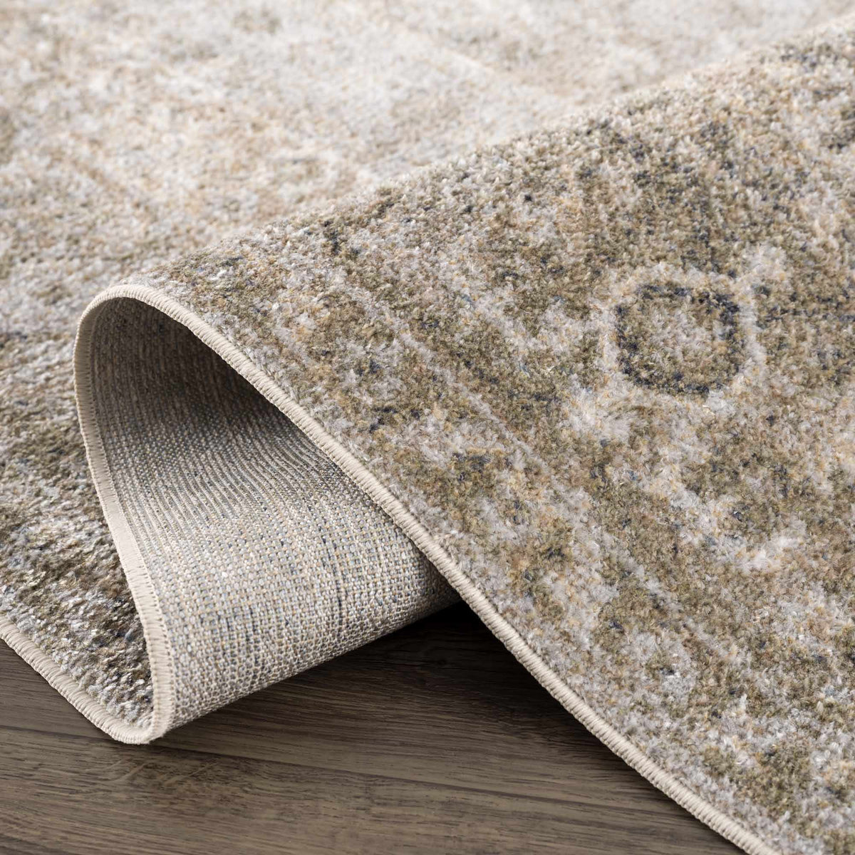 Folded Gael Boutique washable rug from Boutique Rugs, showcasing its soft texture and stylish design in a cozy home setting.
