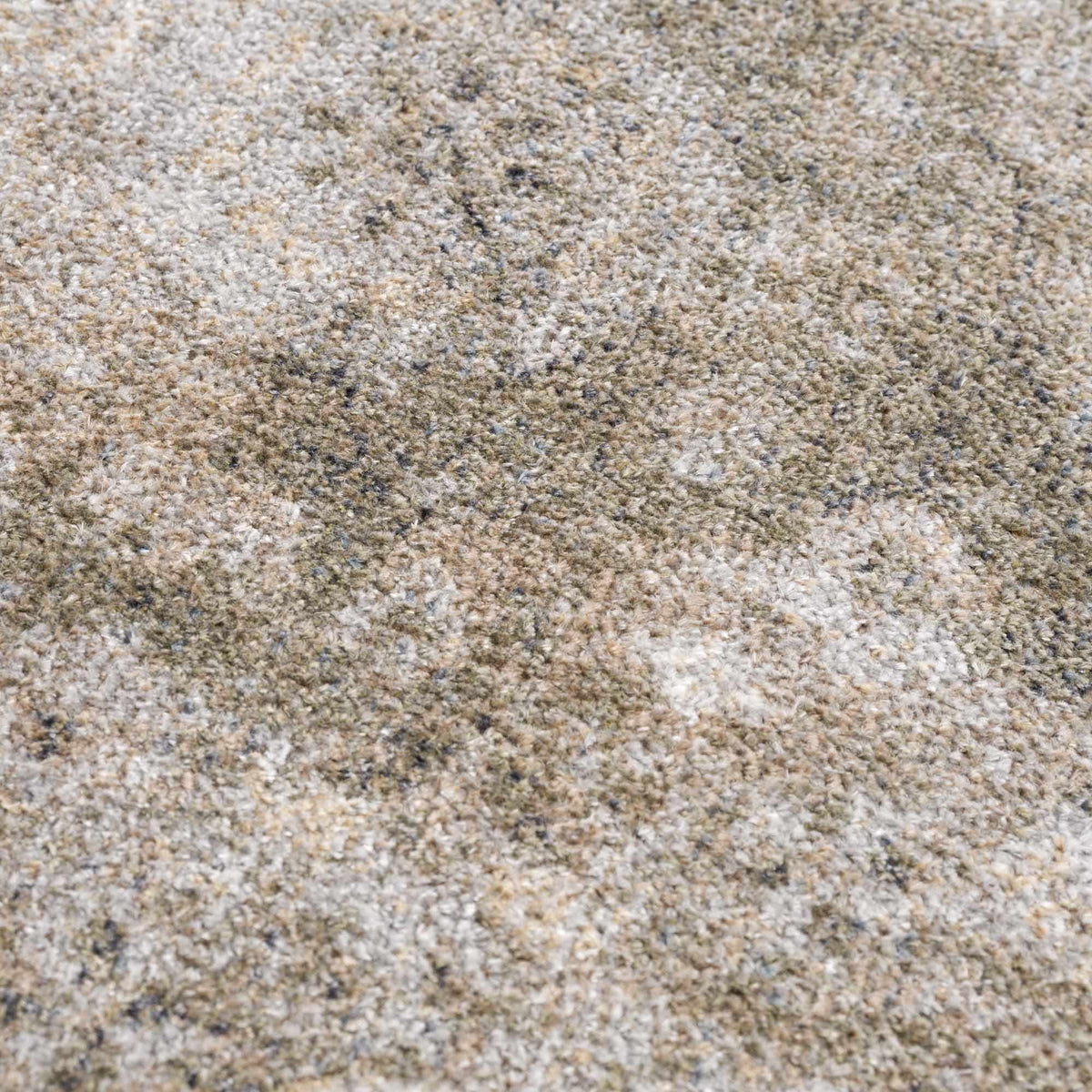 Close-up of a textured washable rug by Boutique Rugs, showcasing soft fabric and intricate pattern in neutral tones.