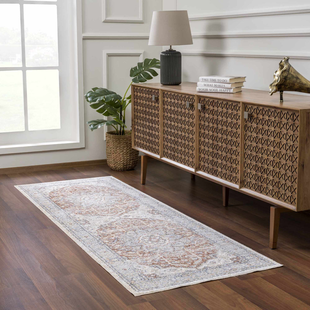 Boutique Rugs Emke Flat Pile Washable Rug in a modern room setting with neutral tones and soft textures.