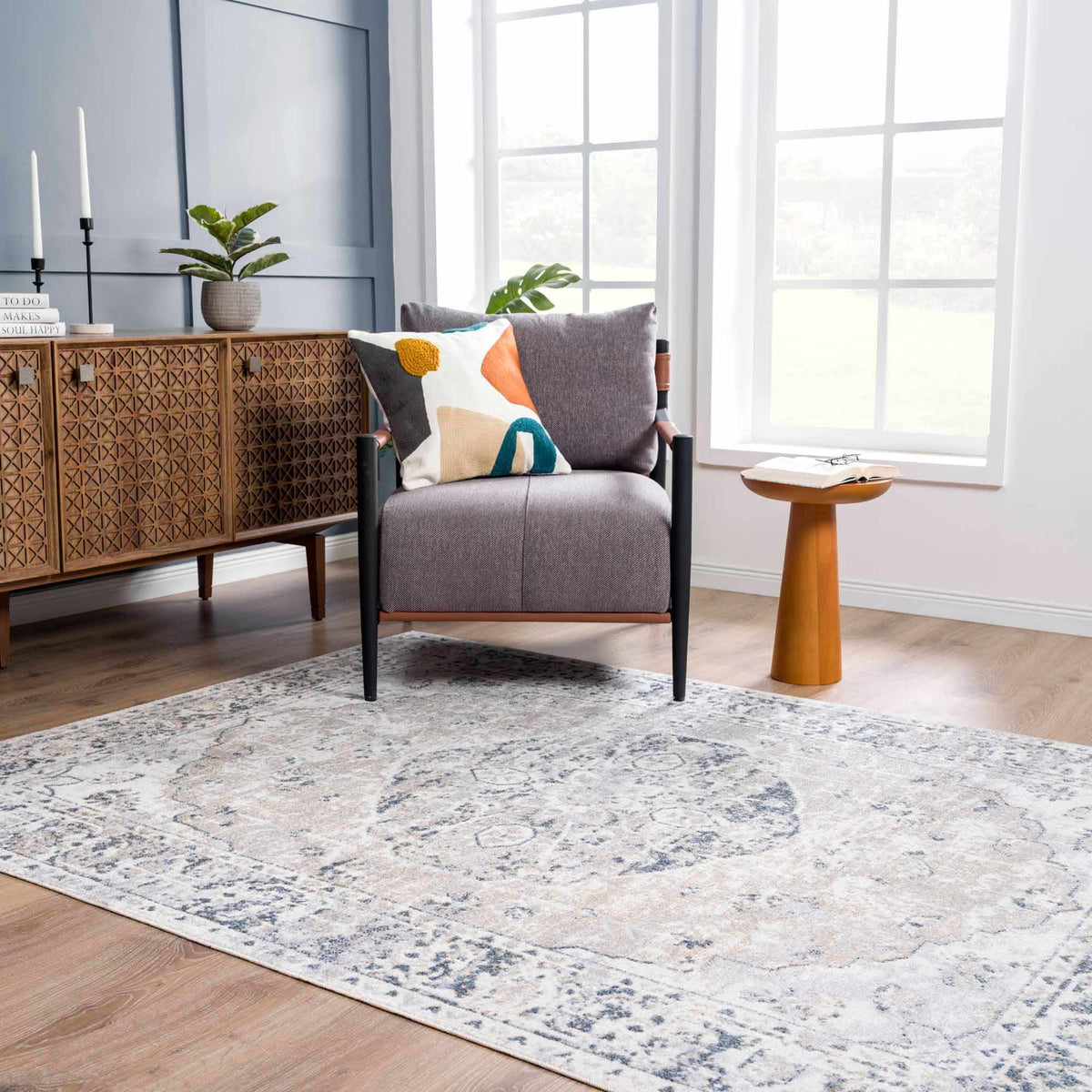 Rudo Flat Pile Washable Rug by Boutique Rugs in a cozy room setting with neutral tones and soft texture.