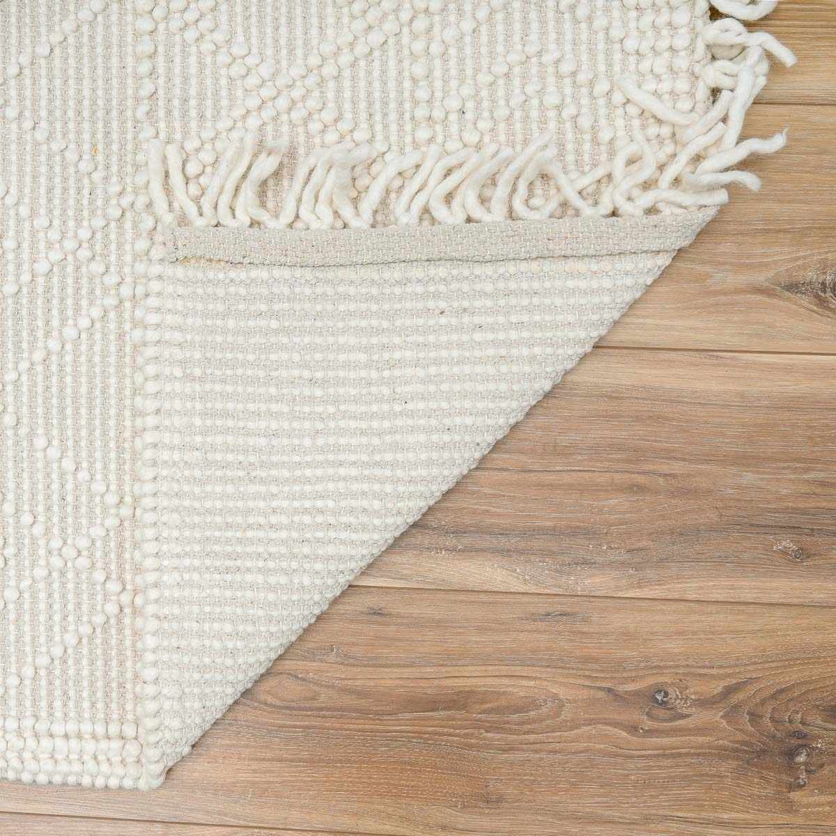 Ramsbury Beige Trellis Wool Rug from Boutique Rugs, showcasing a classic geometric pattern in soft beige and warm tones.