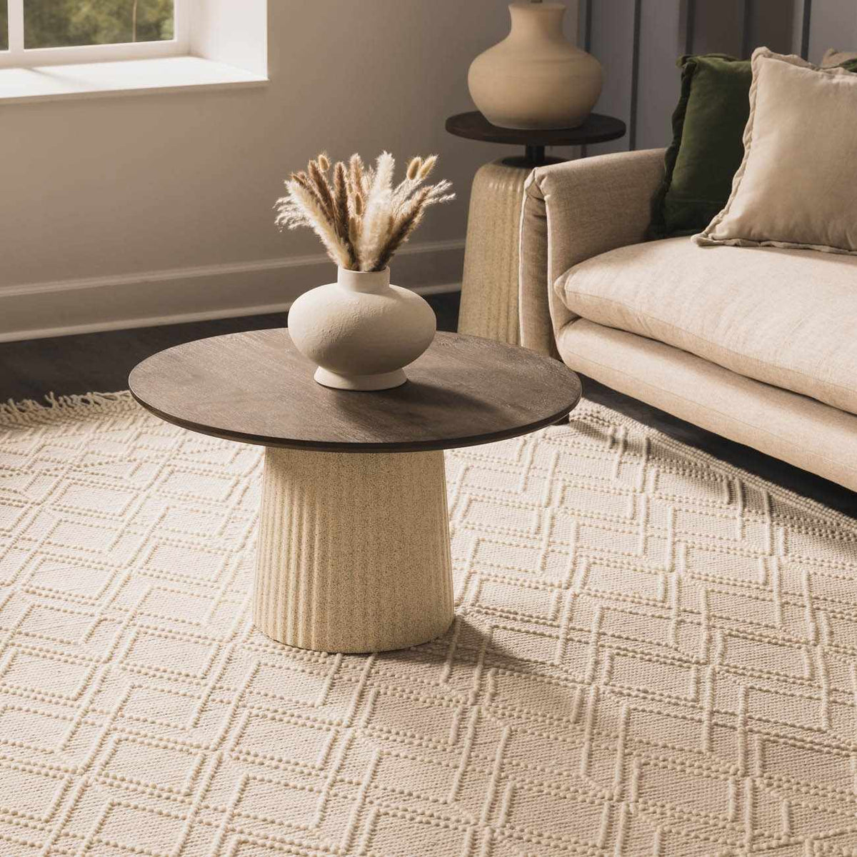 Beige trellis wool rug by Boutique Rugs, shown in a cozy living room setting with furniture and decor.
