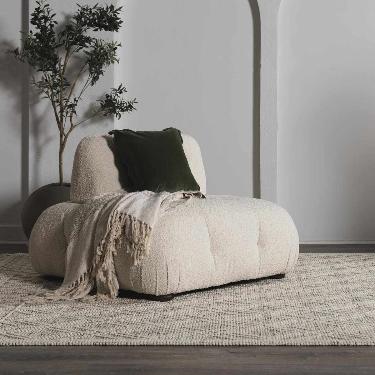 Ramsbury Beige Trellis Wool Rug from Boutique Rugs displayed in a cozy living room setting with furniture and decor.