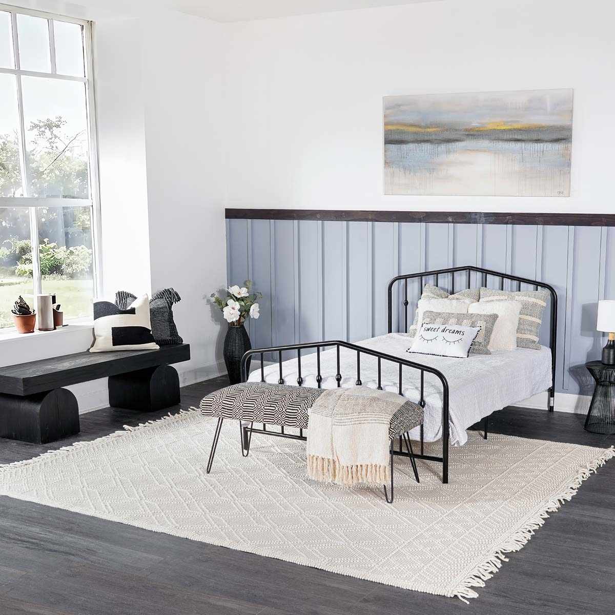 Beige trellis wool rug by Boutique Rugs, featuring a classic pattern, shown in a cozy room setting with furniture and decor.