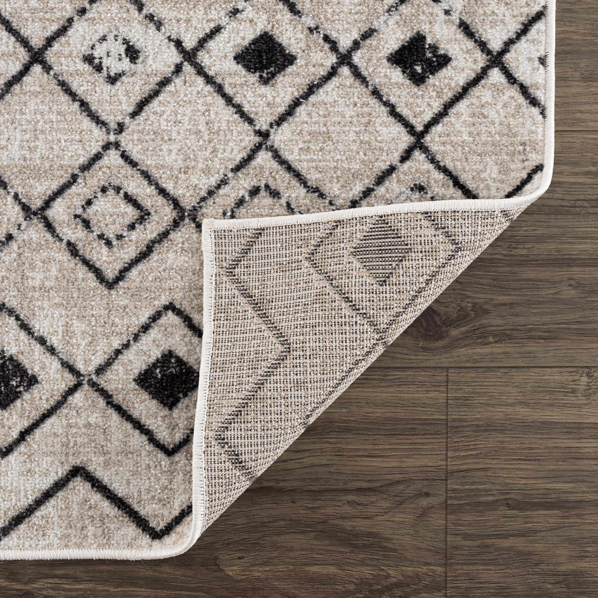 Folded Joppatowne washable area rug by Boutique Rugs, showcasing soft fabric and stylish design for home decor.