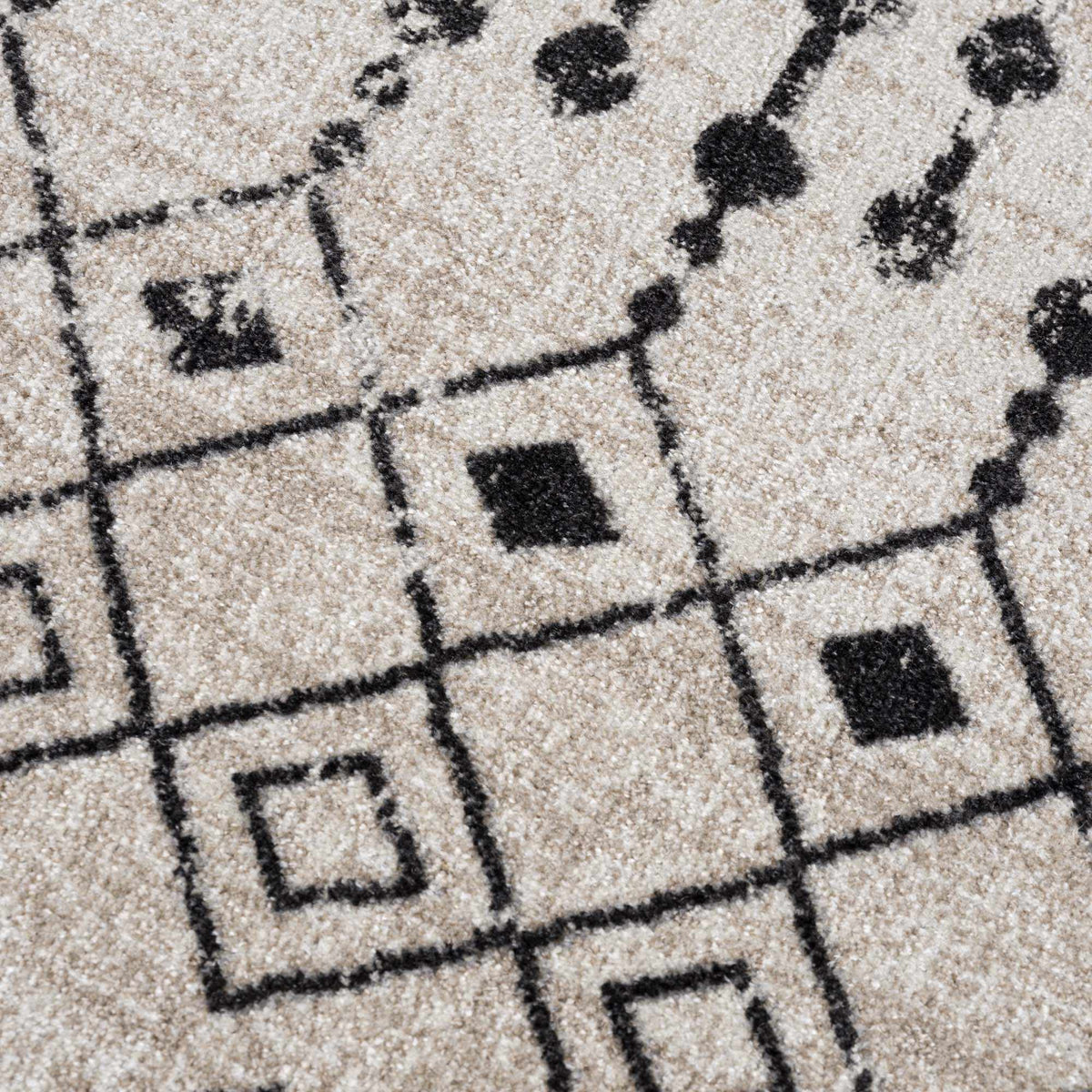 Textured Joppatowne washable area rug by Boutique Rugs featuring a modern design in neutral tones, showcasing soft fabric and intricate pattern.