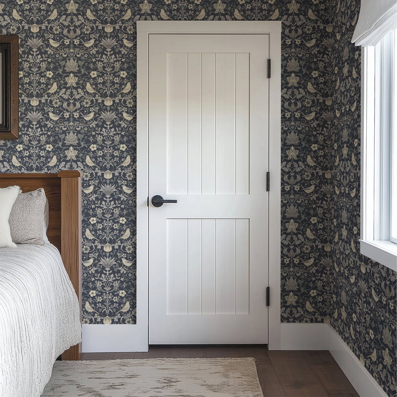North and Finch Millie in Cornflower wallpaper with a floral pattern in shades of blue and purple on a light background.