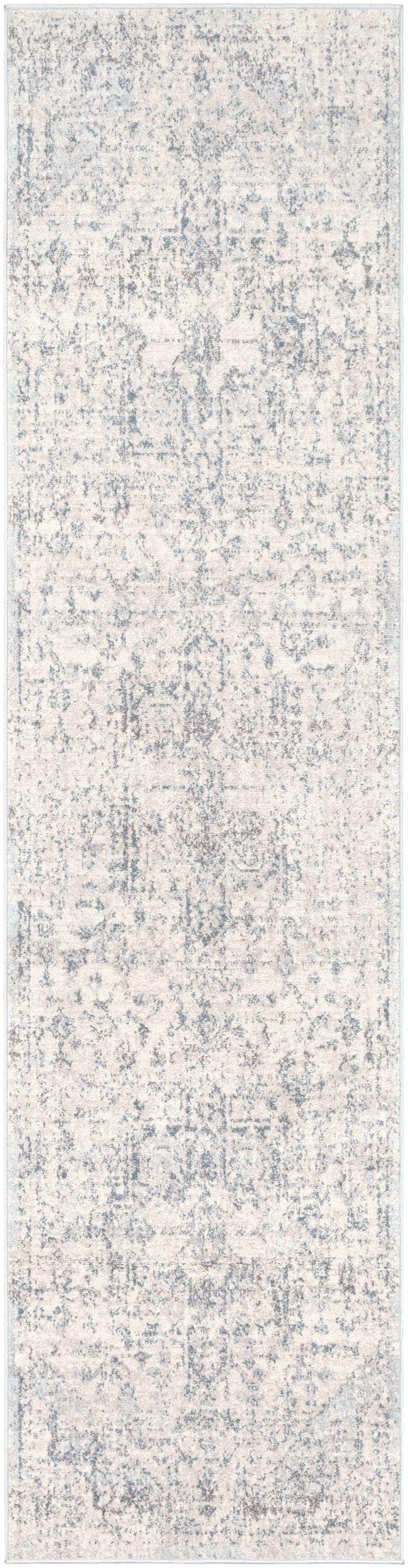 Colorful Orrick area rug by Boutique Rugs featuring intricate geometric patterns and a plush, soft texture.