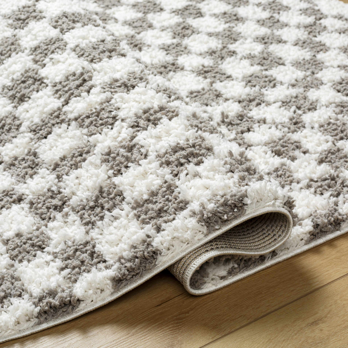 Taupe checkered plush rug from Boutique Rugs, featuring soft, cozy fabric and a stylish pattern for a modern home decor.