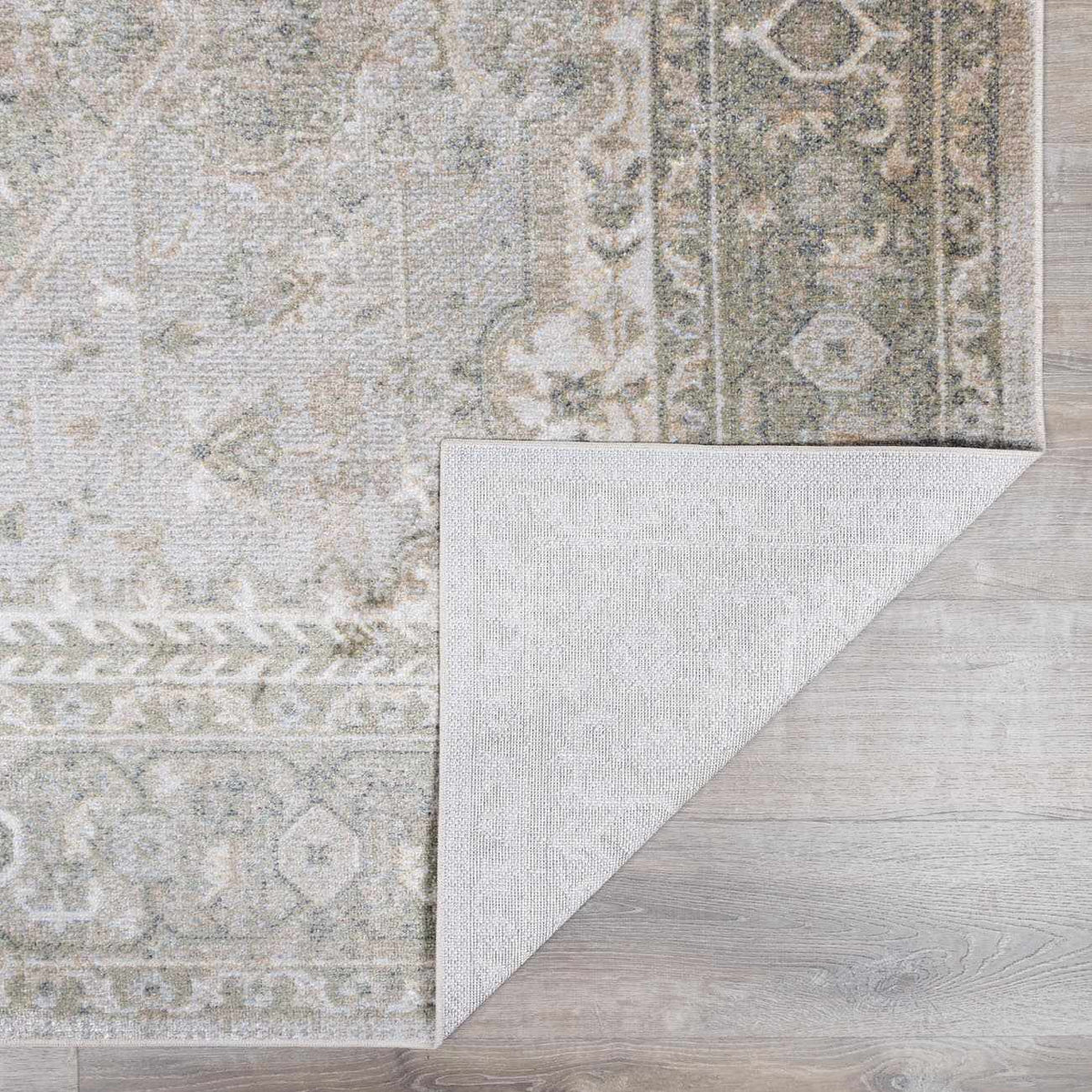 Folded Gael Boutique washable rug from Boutique Rugs, featuring soft textured fabric and neutral tones suitable for home decor.
