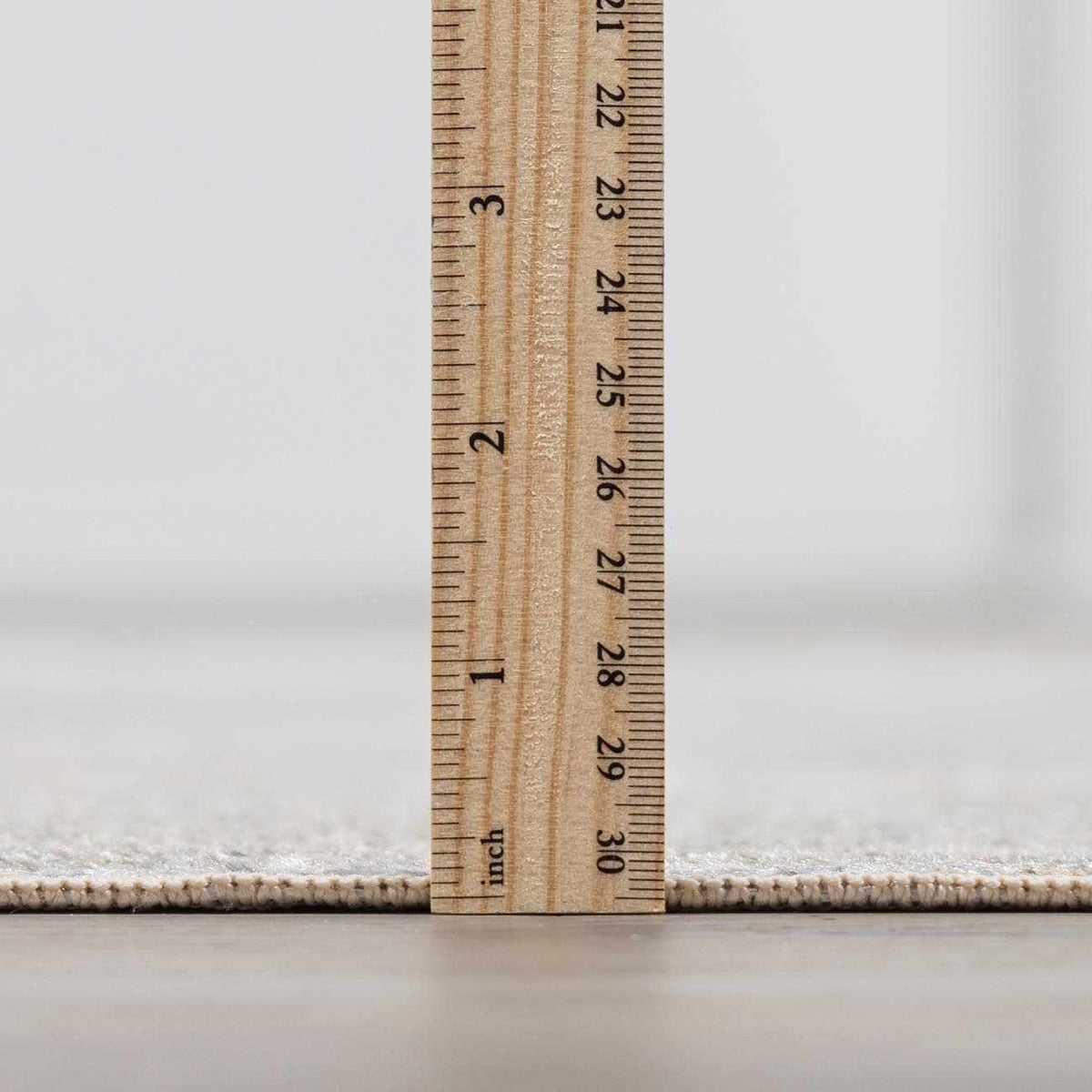 Close-up of the Gael Boutique washable rug by Boutique Rugs, showcasing its soft, textured pile in a neutral color.