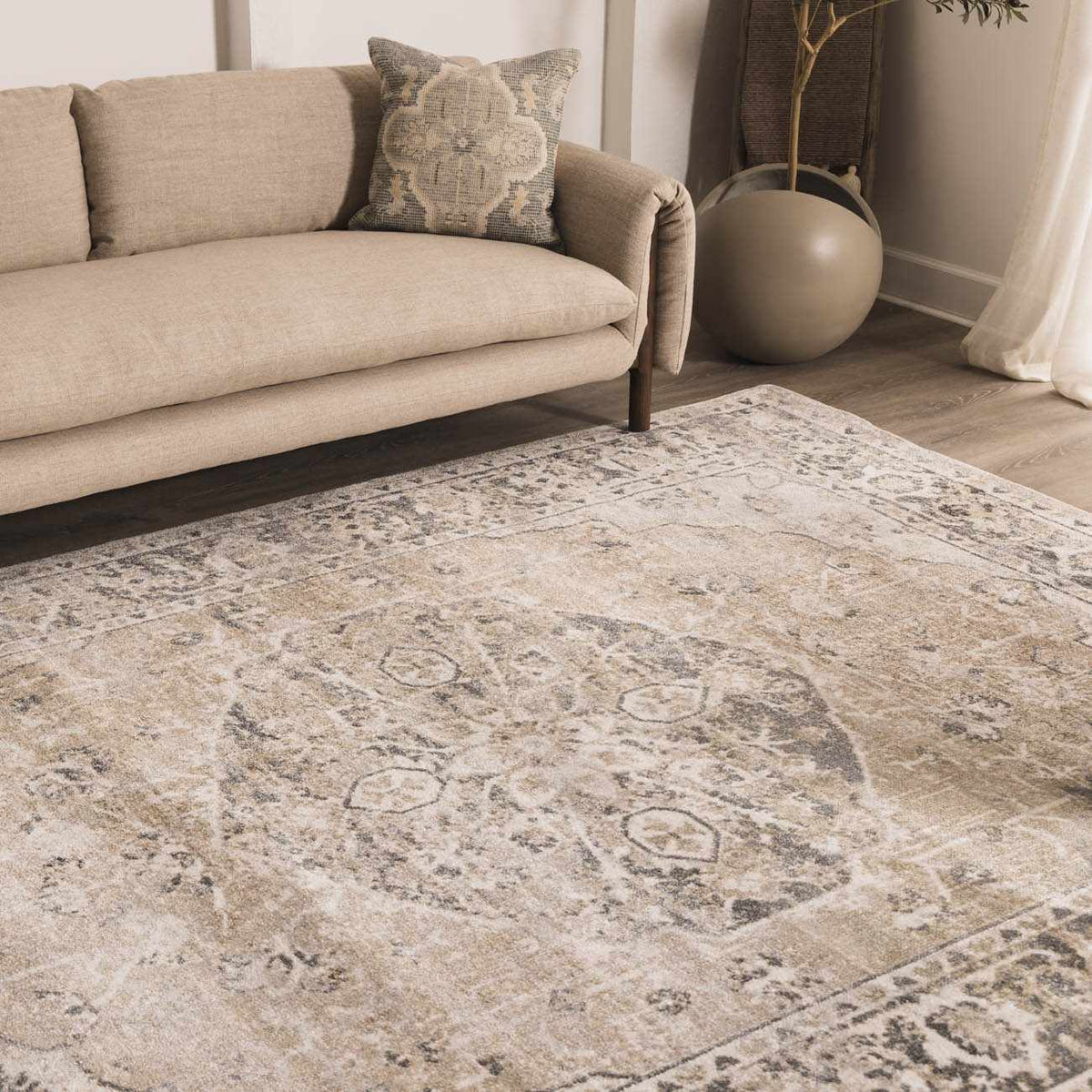 Beige flat pile washable rug from Boutique Rugs in a cozy living room setting, showcasing soft texture and modern design.