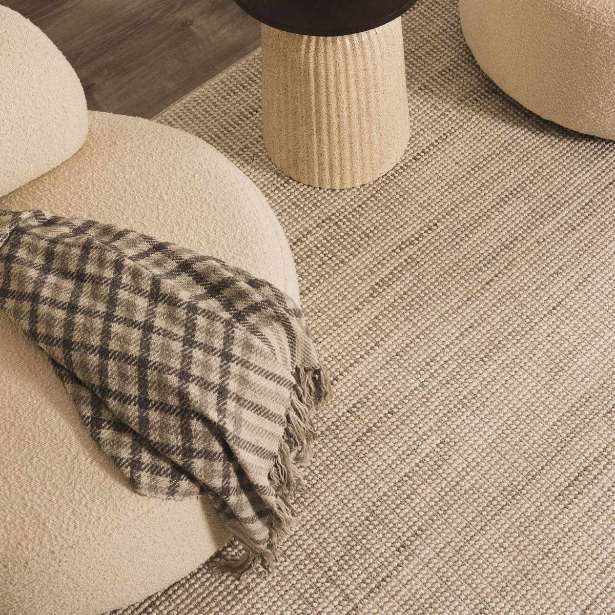 Gowan Cream Area Rug by Boutique Rugs, soft plush rug with a subtle cream and beige pattern, in a cozy living room setting