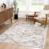 Hauteloom Mudgee Area Rug in a cozy room scene, showcasing its intricate design and soft, durable fabric for living spaces.