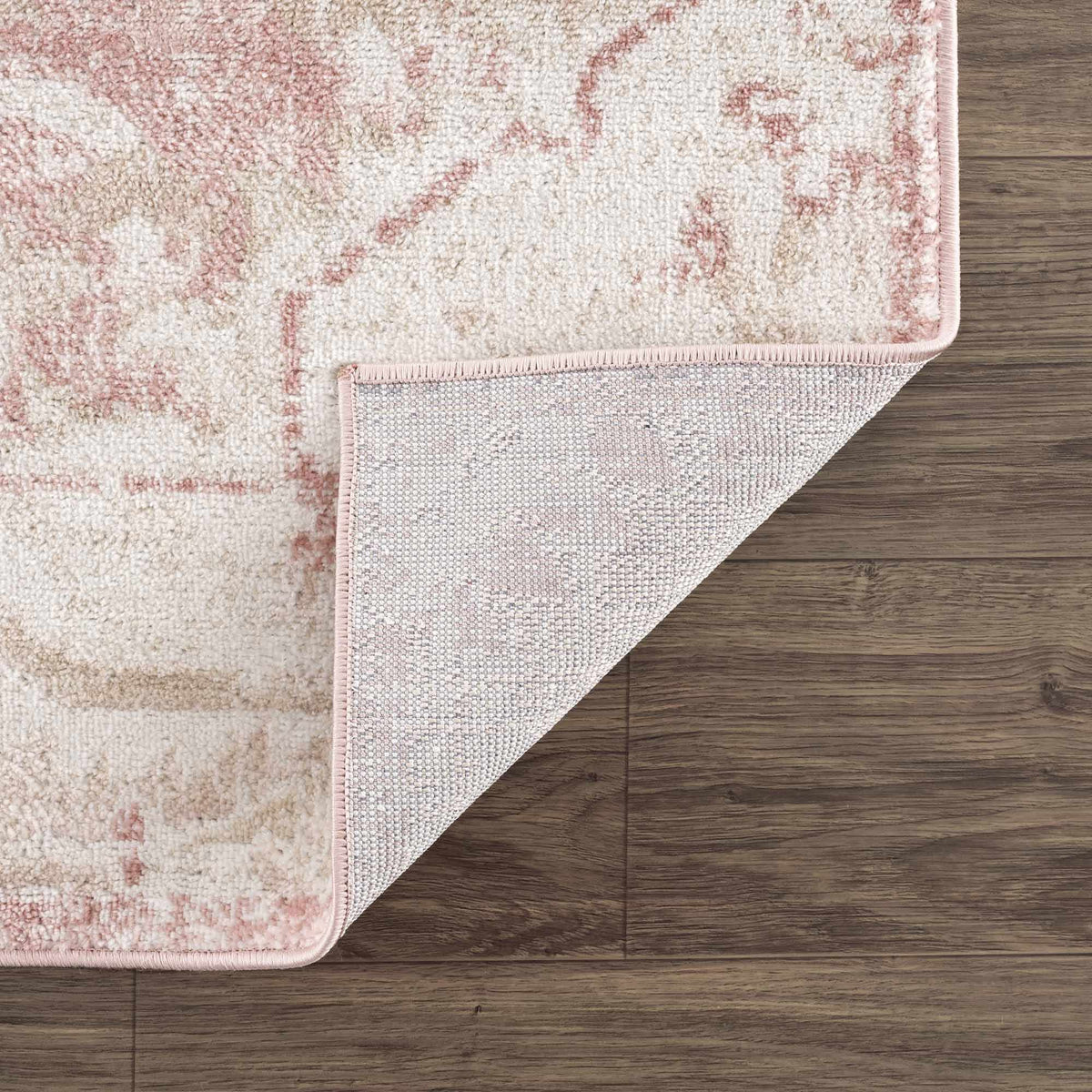 Folded Boutique Rugs Leonora area rug with intricate geometric pattern in neutral tones, showcasing soft texture and craftsmanship.