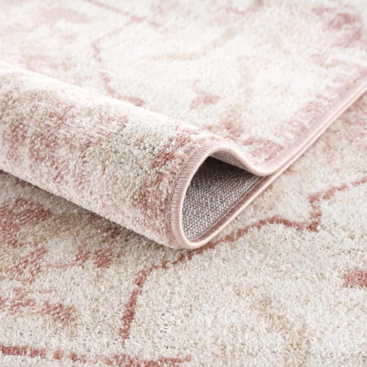 Folded Boutique Rugs Leonora area rug with intricate patterns and soft textures, suitable for living room or bedroom decor.