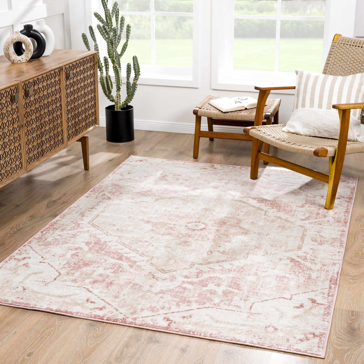 Leonora area rug by Boutique Rugs displayed in a room scene, showcasing its intricate pattern and soft, neutral tones.