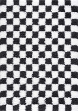 Black and white checkered area rug from Boutique Rugs, featuring a modern geometric design and soft textured surface.