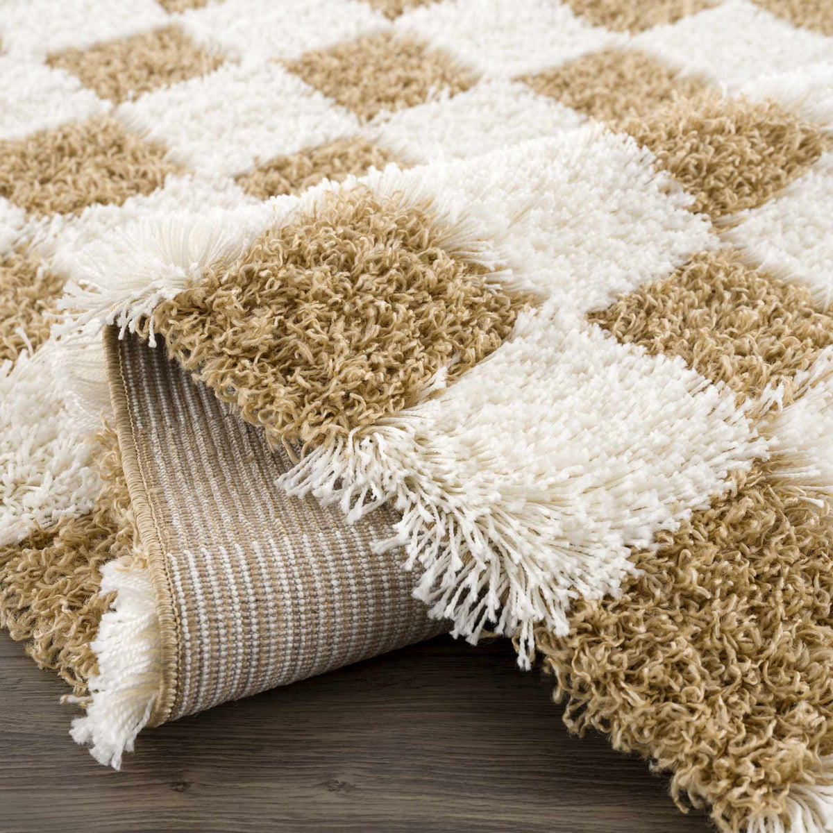 Folded mustard checkered area rug by Boutique Rugs, showcasing a stylish geometric pattern and soft texture.