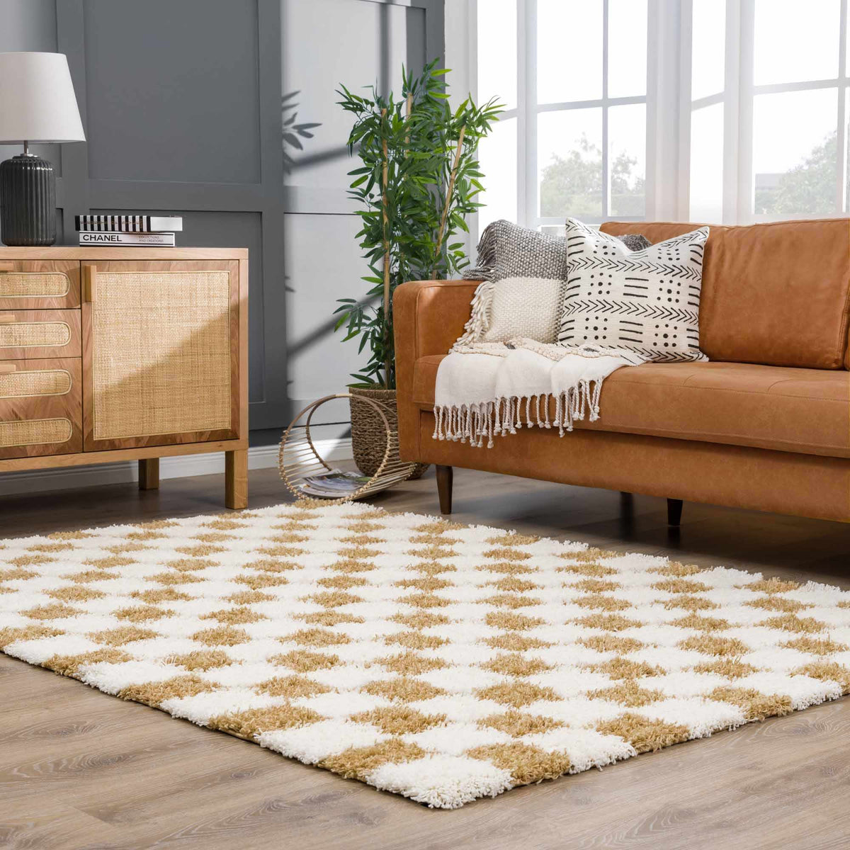 Atira Mustard Checkered Area Rug by Boutique Rugs, stylish yellow and gray checkered pattern in a cozy living room scene.