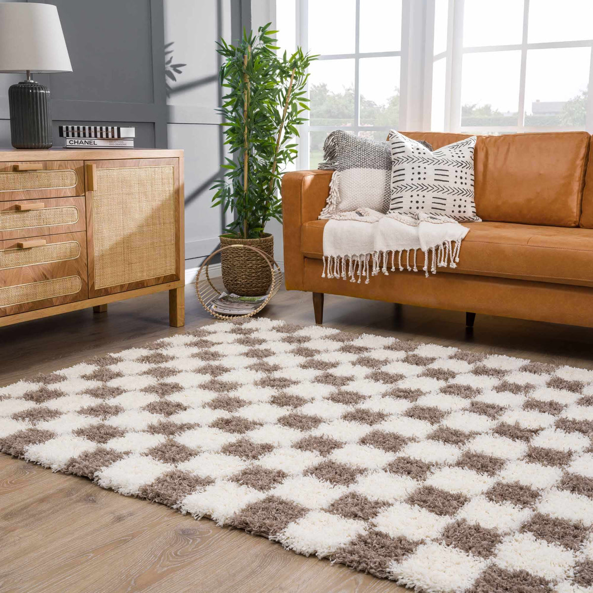 Brown checkered area rug by Boutique Rugs in a room scene, showcasing its pattern and cozy texture.