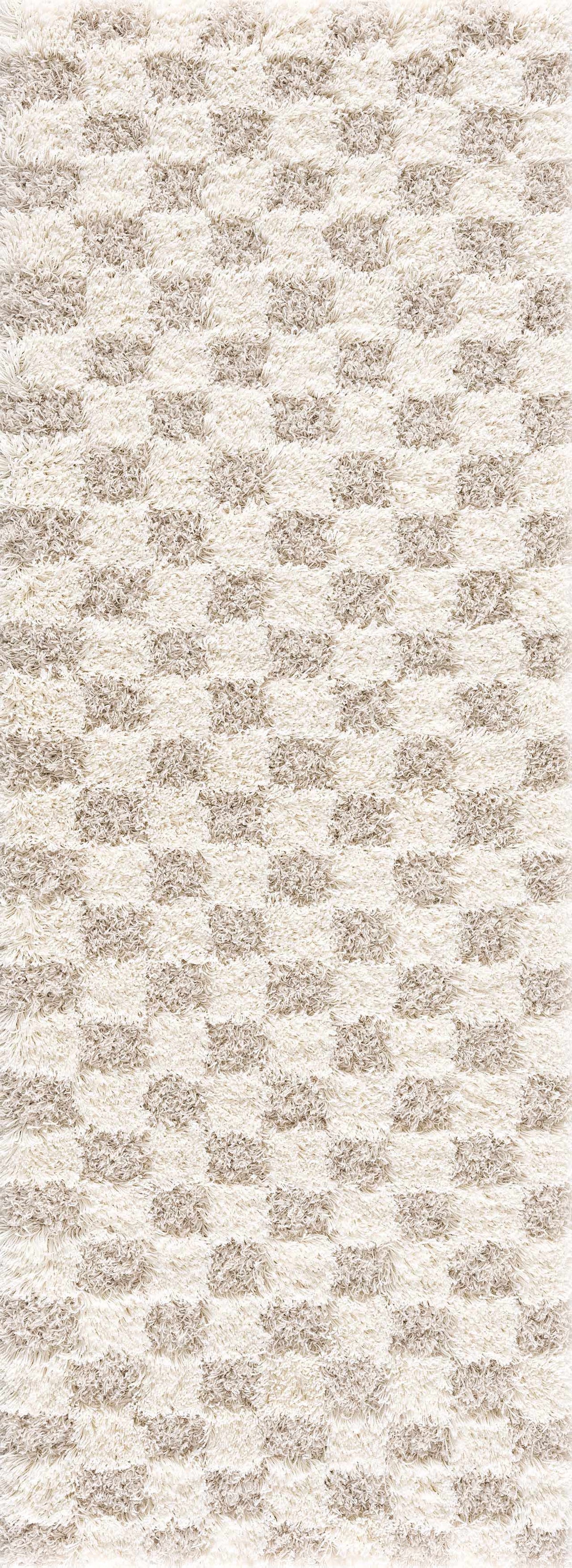 Light brown checkered area rug from Boutique Rugs featuring a classic checkered pattern and soft textured surface.