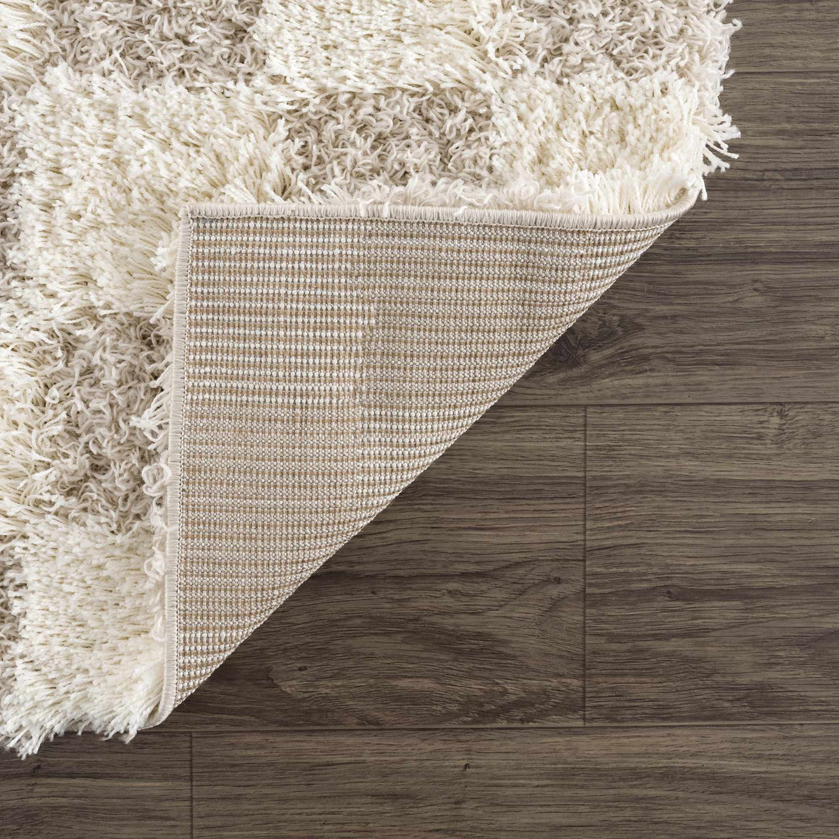 Light brown checkered area rug from Boutique Rugs, featuring a stylish pattern and soft texture suitable for living spaces.