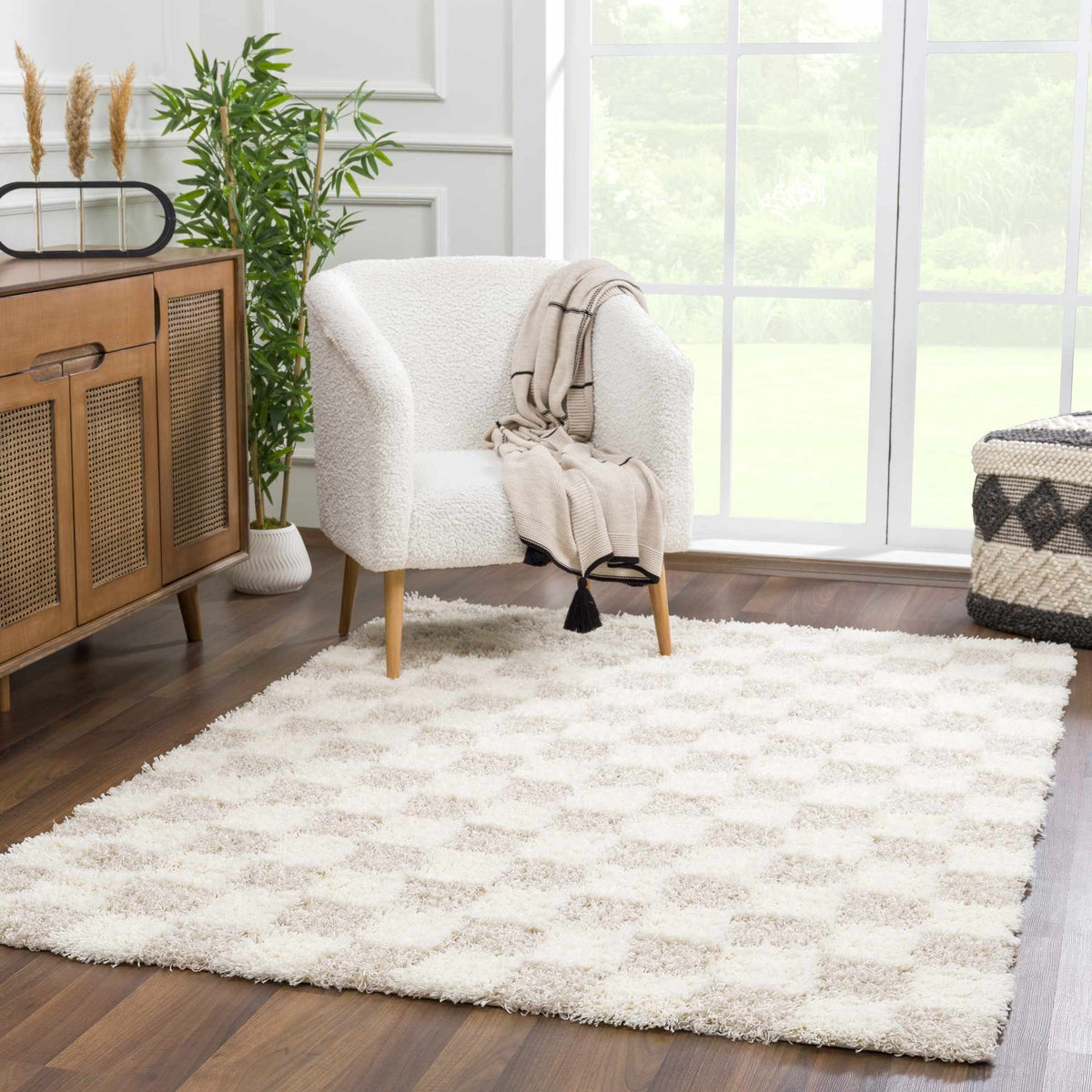Light brown checkered area rug from Boutique Rugs, styled in a room scene with modern decor and wooden flooring.