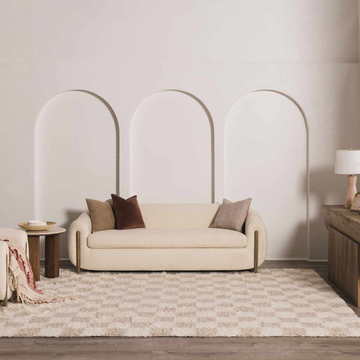 Light brown checkered area rug by Boutique Rugs, shown in a cozy room setting with modern decor.