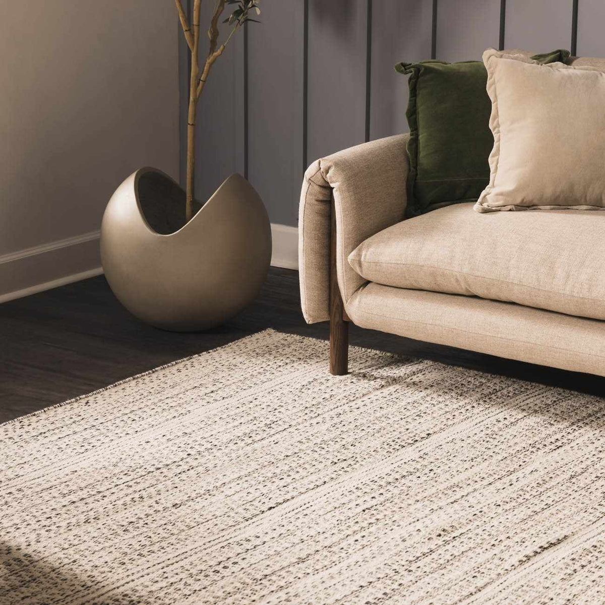 Hauteloom Williford Wool Area Rug in a cozy living room setting with neutral tones and textured design.