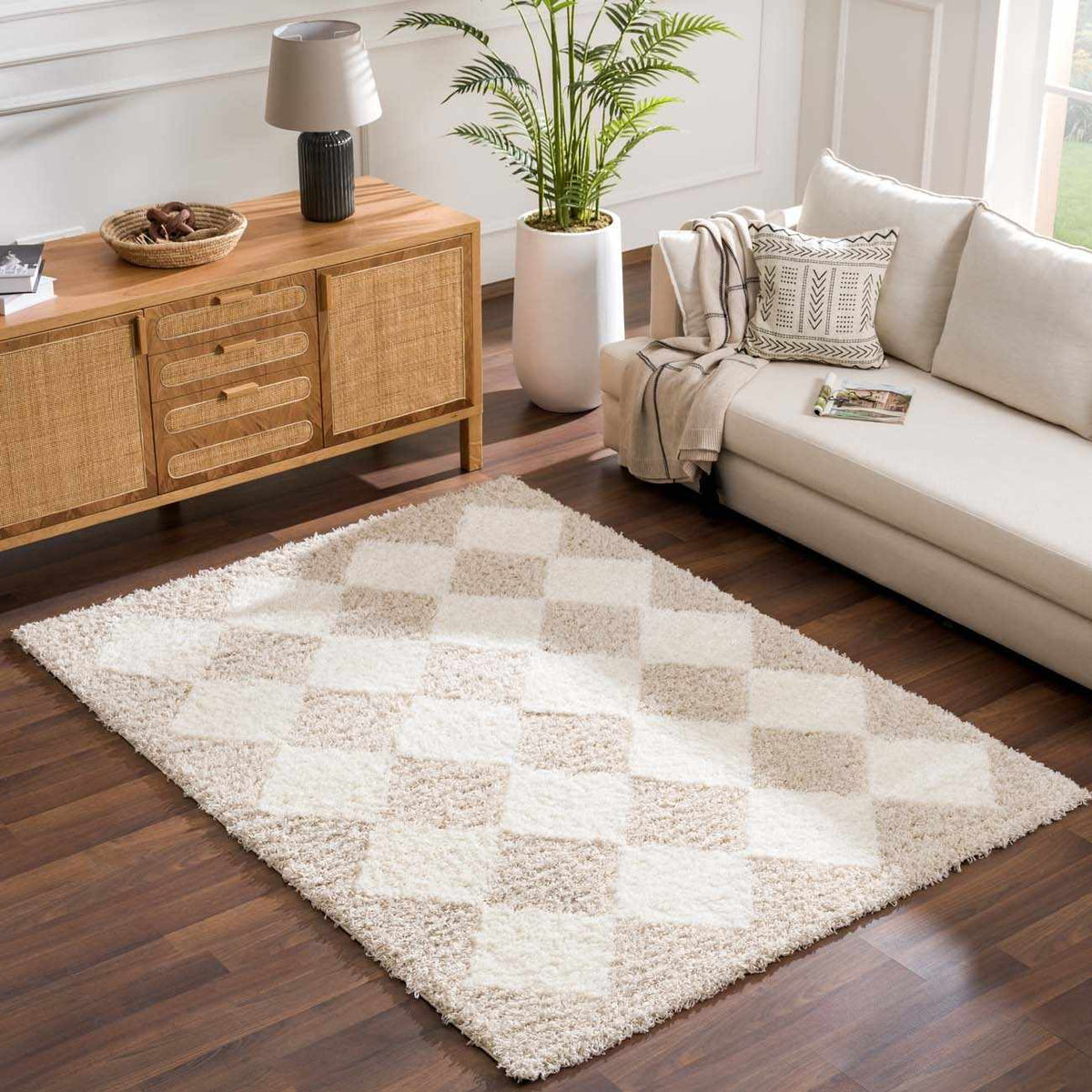 Hauteloom Zahur cream and beige diamond area rug displayed in a room setting with modern decor.