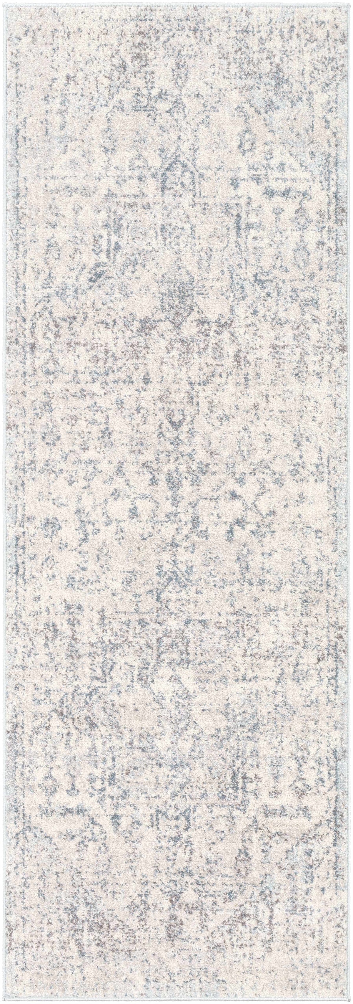 Hauteloom Orrick area rug with intricate geometric patterns in neutral tones, perfect for living room or bedroom decor.