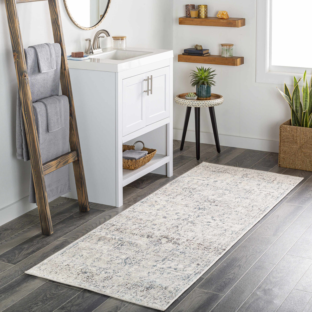 Hauteloom Orrick area rug in a room scene, showcasing a stylish rug with geometric patterns on a hardwood floor.