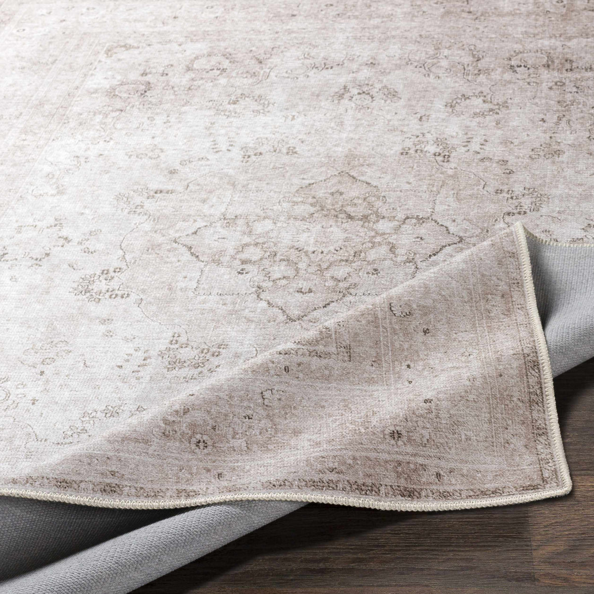 Vintage flat pile washable rug from Boutique Rugs with a soft, textured surface and classic design in neutral tones.