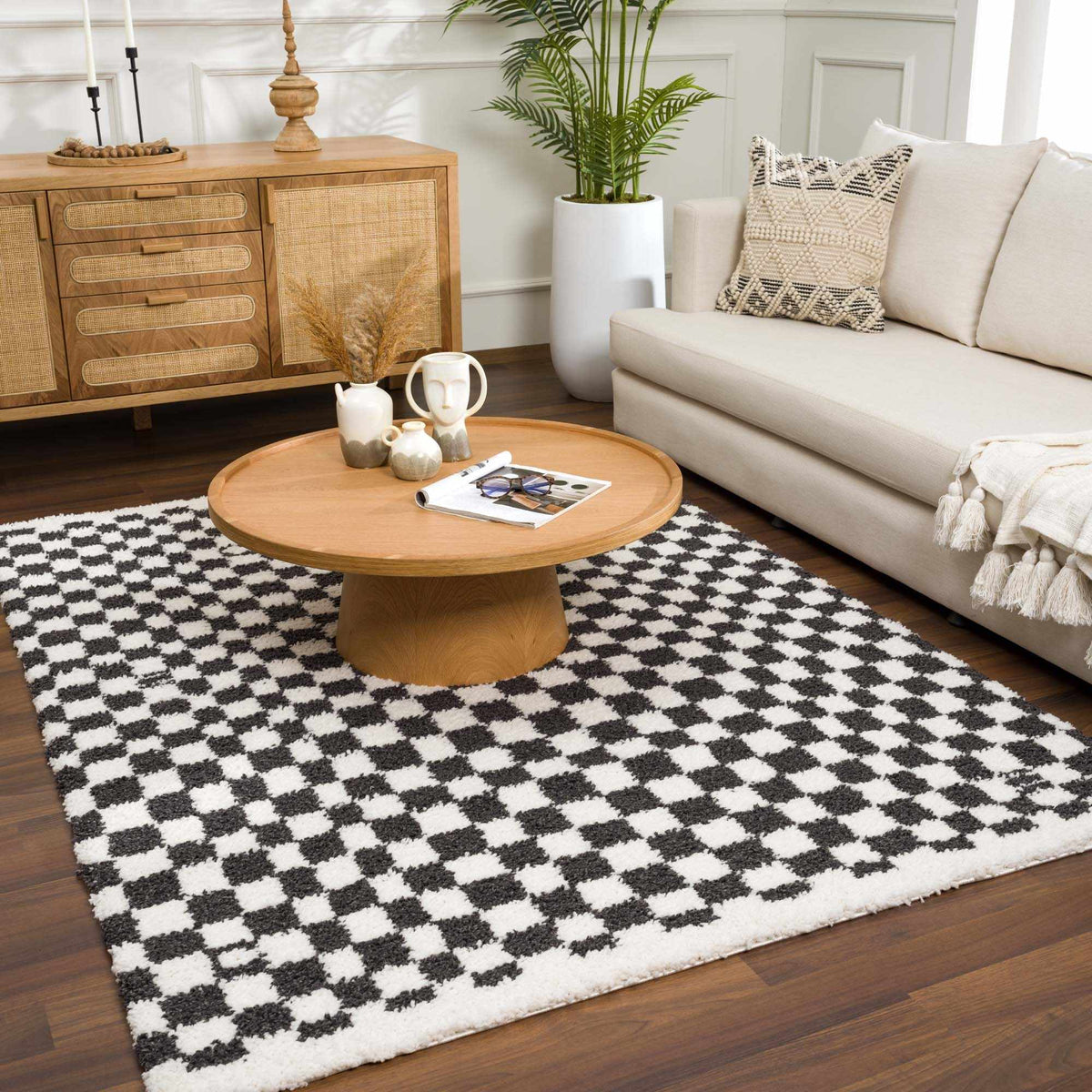 Black and white checkered shag rug by Boutique Rugs, featuring soft, plush texture in a stylish room scene.