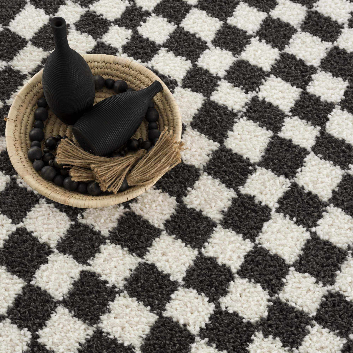 Black and white checkered shag rug by Boutique Rugs, featuring a soft, plush texture and modern geometric pattern.