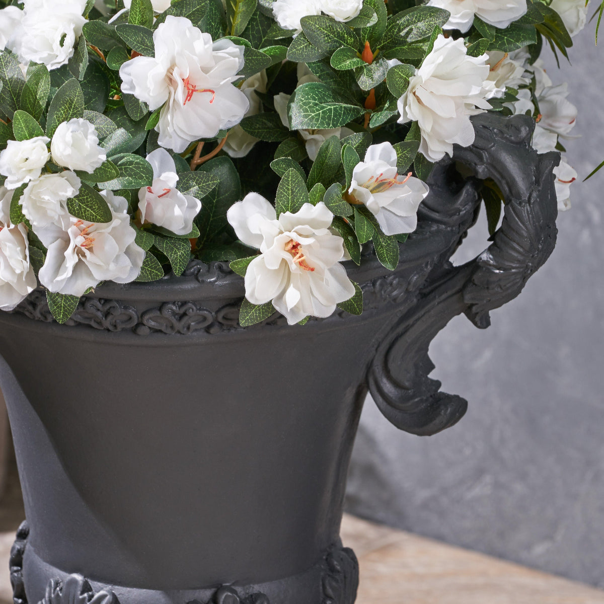 HouseOfZazla Delphine Urn Planter with intricate design, ideal for indoor or outdoor plant display.