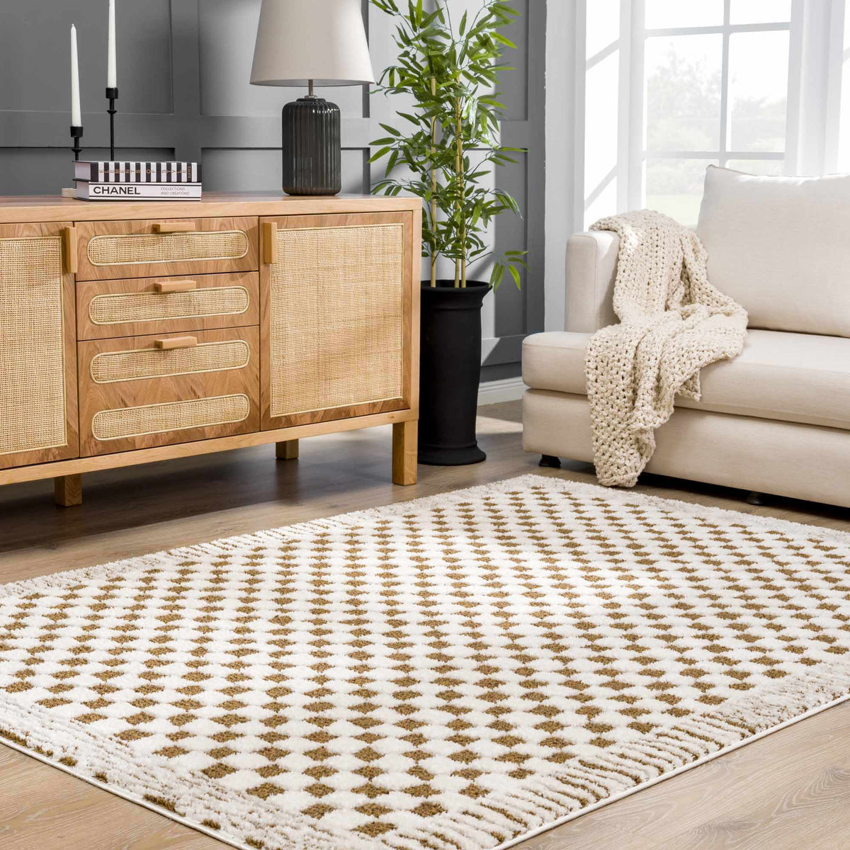 Leryn Brown Checkered Plush Rug from Boutique Rugs displayed in a cozy room setting with soft lighting and modern decor.
