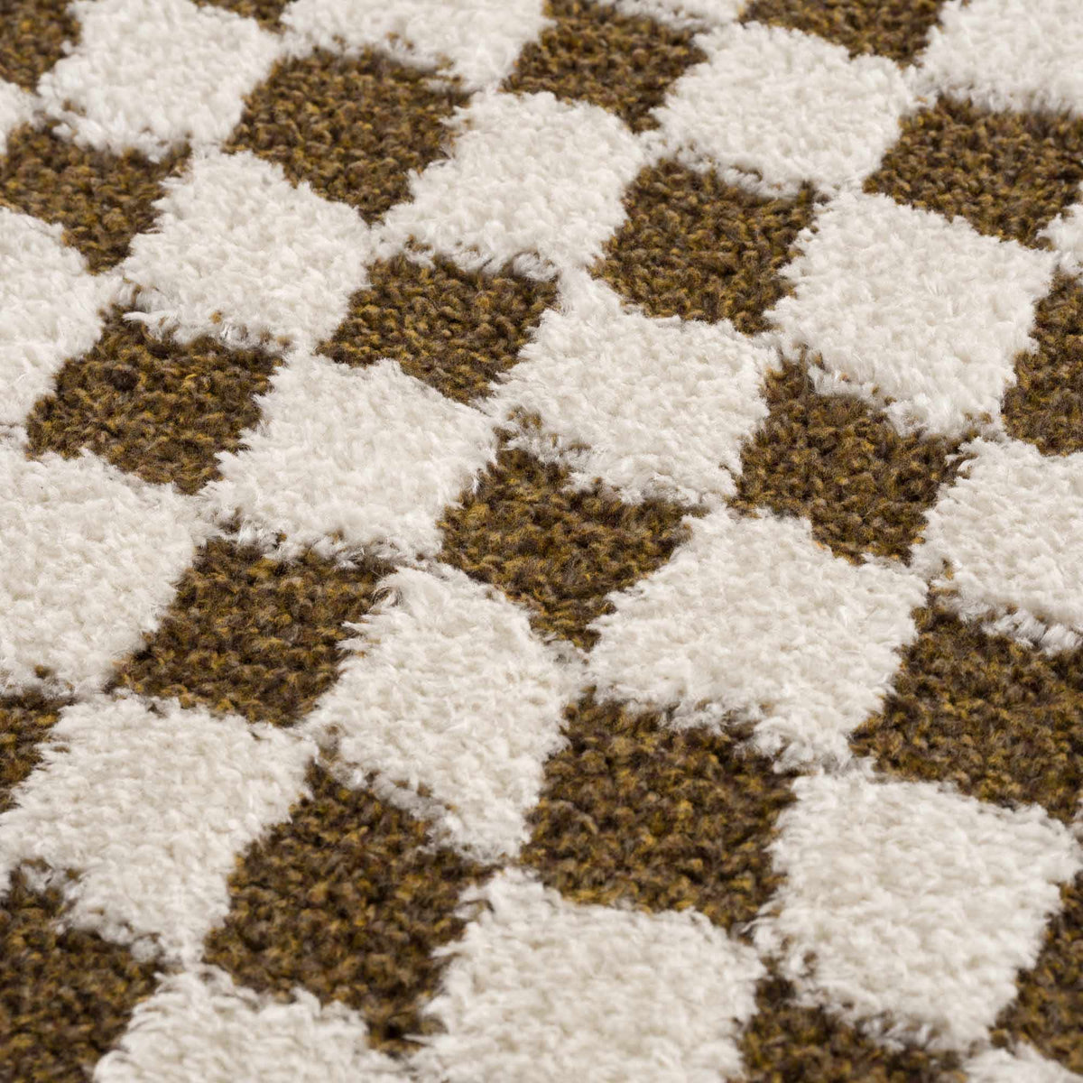 Leryn Brown checkered plush rug from Boutique Rugs, showing soft, textured fabric with a brown and beige checkered pattern.