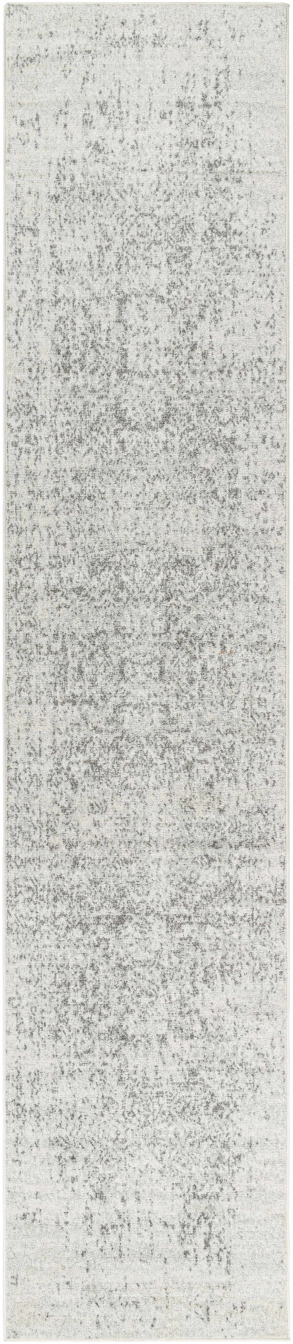 Hauteloom Rachel area rug with intricate geometric pattern in neutral tones, ideal for living room or bedroom decor.