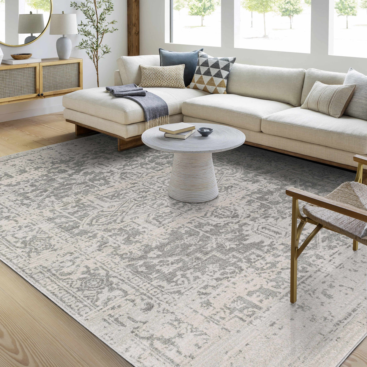 Hauteloom Rachel area rug in a room scene, showcasing its textured design and neutral color scheme on a hardwood floor.