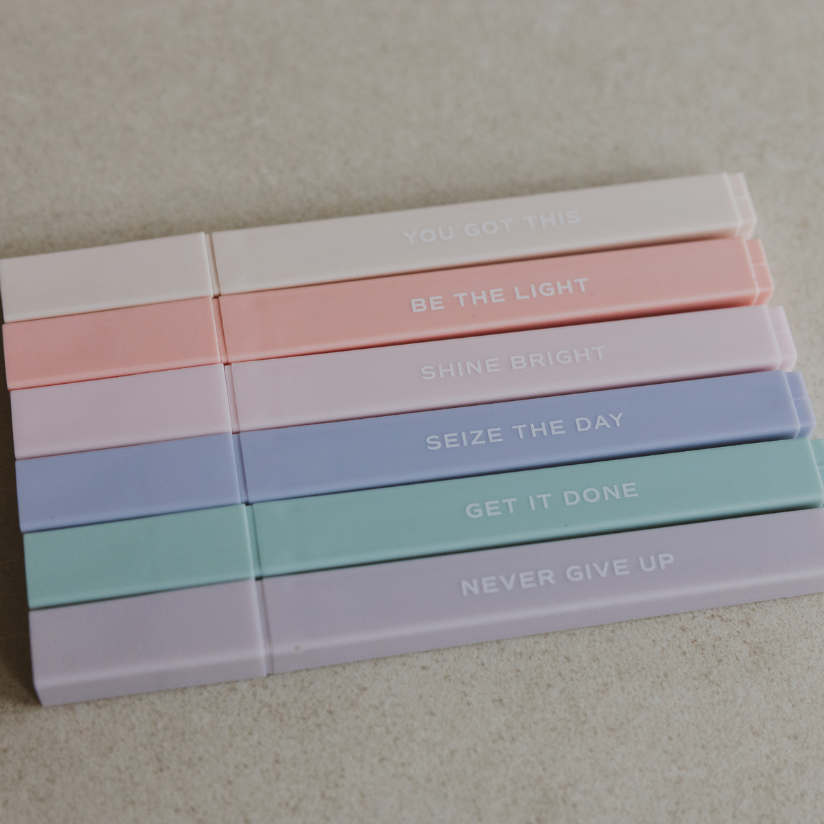 Set of six neutral-colored BlackbirdOak highlighters on kraft paper background, showcasing muted shades for highlighting and note-taking.