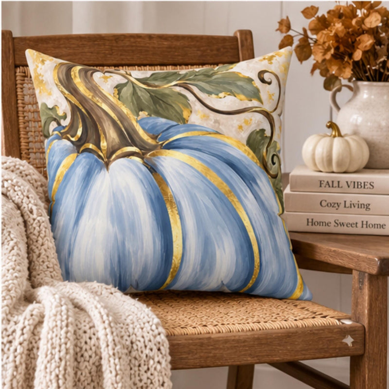 Blue pumpkin throw pillow with gold accents, elegant autumn home decor by Kraft Paper Scissors, 18x18 inches.