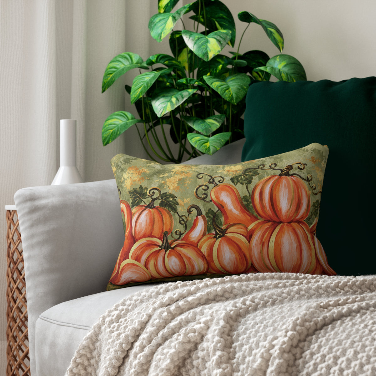 Orange pumpkin watercolor lumbar pillow by Kraft Paper Scissors featuring sage green and gold accents, ideal for fall home decor.