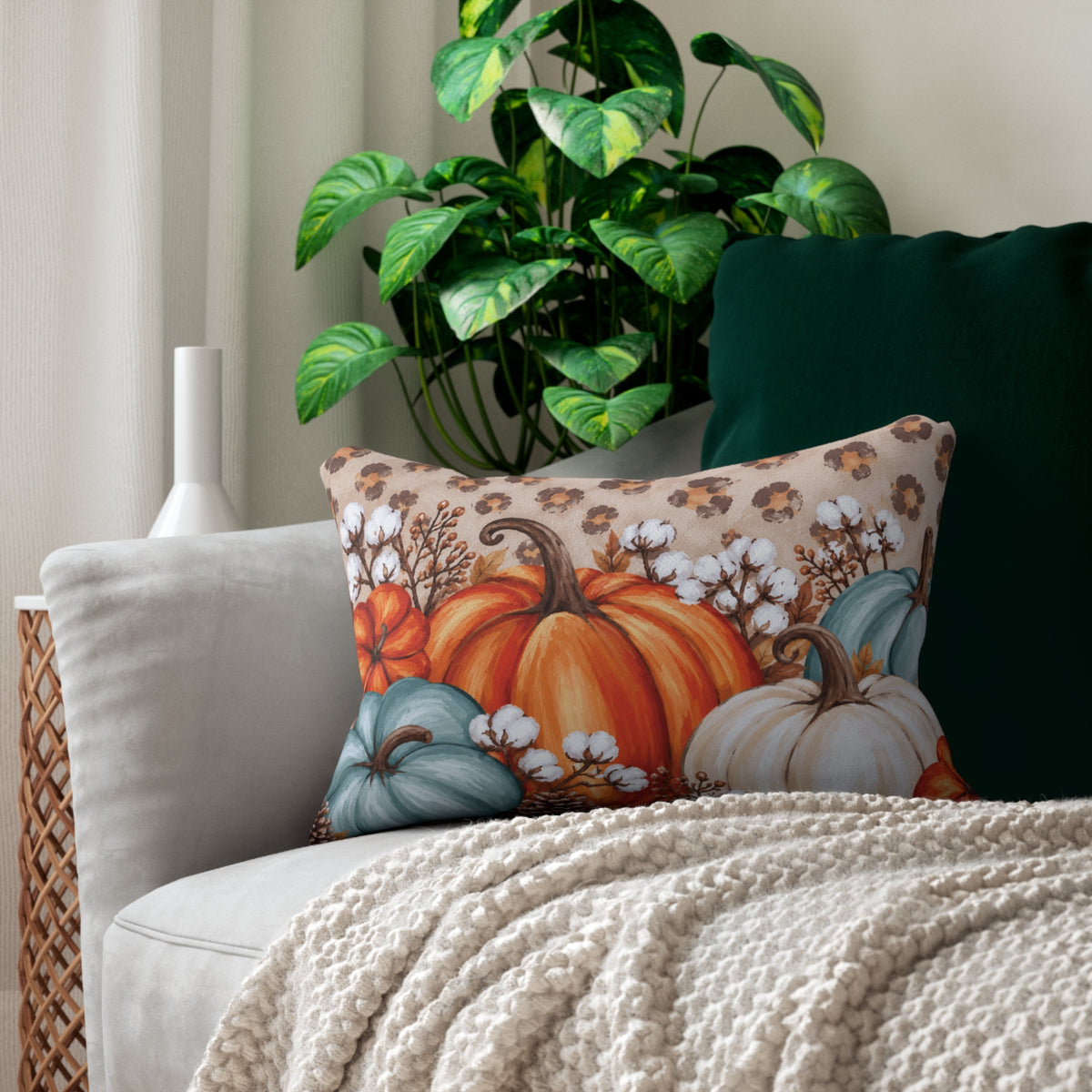 Rustic pumpkin lumbar pillow by Kraft Paper Scissors featuring blue, orange, and cream fall-themed home decor.