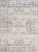 A washable Boutique Rugs area rug with geometric design in neutral tones, displayed on a hardwood floor.