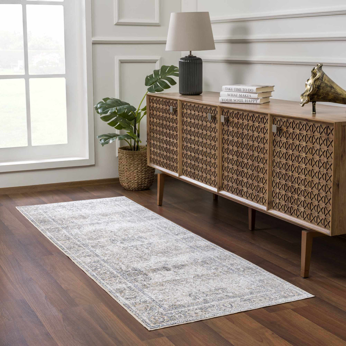 A washable rug from Arias Boutique Rugs displayed in a stylish room scene, showcasing its soft texture and modern design.