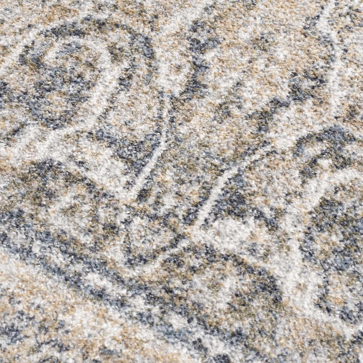 A washable Boutique Rugs Arias Boutique rug with a textured pattern in neutral tones, shown on a studio background.