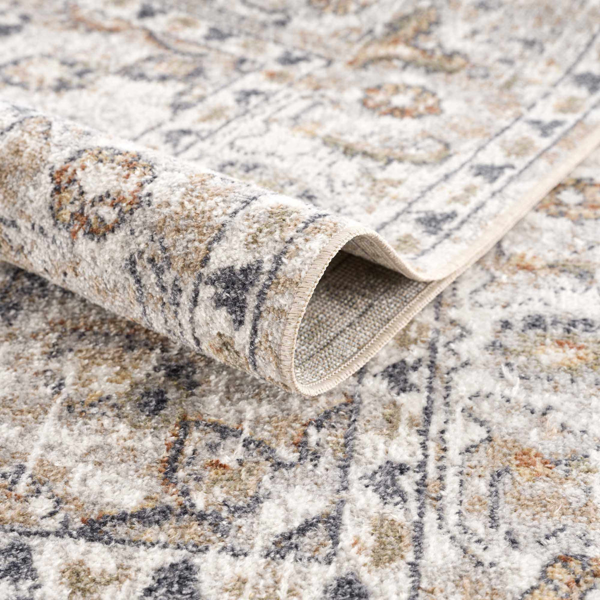 Folded Boutique Rugs Hiti Cream flat pile washable rug with a soft, neutral-toned design suitable for home decor.